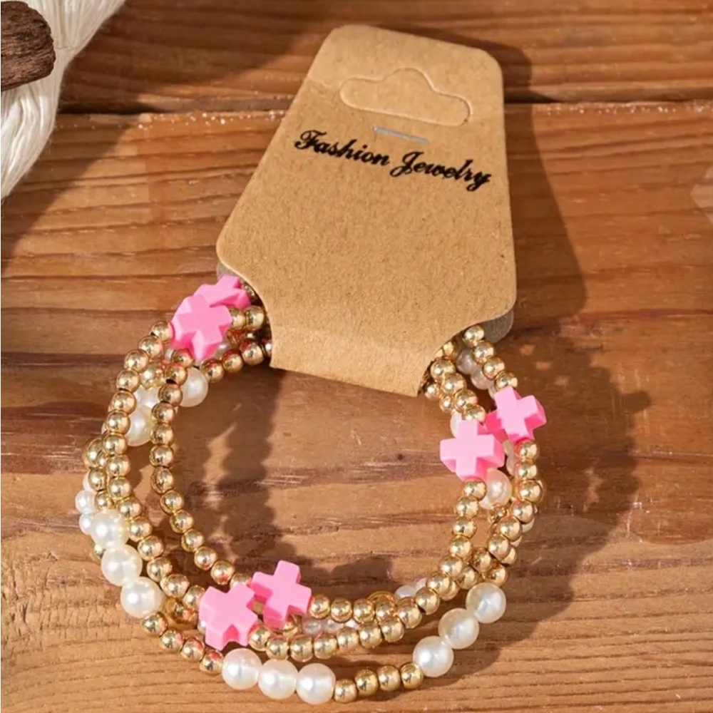 Set of 4 Gold and Pink Beaded Bracelet Set w/ cross
